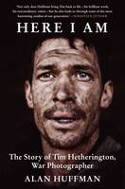 Cover image of book Here I Am: The Story of Tim Hetherington, War Photographer by Alan Huffman